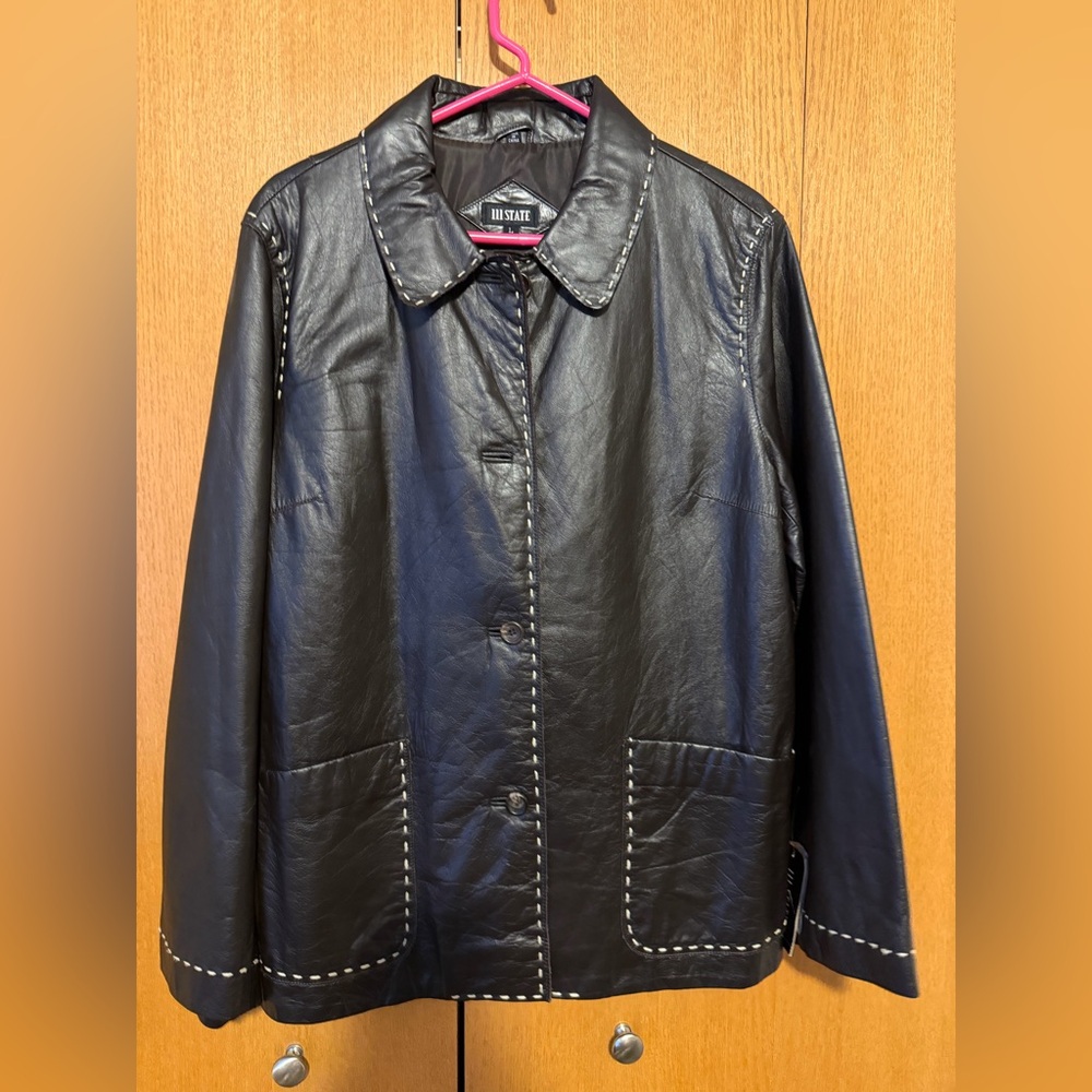 Elegant Black Leather Jacket with White Accents